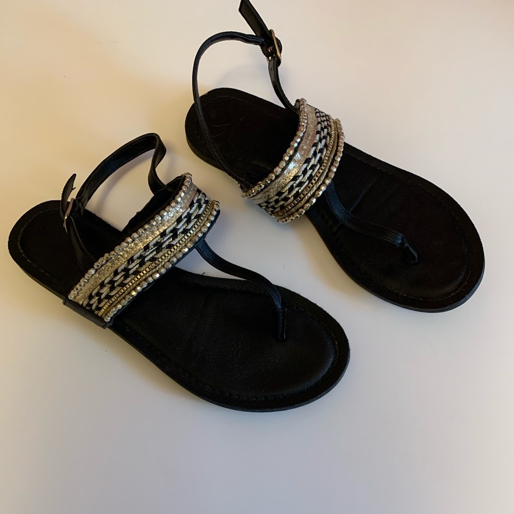 22. Black and Gold Fergalicious Sandals